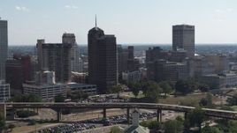 5.7K aerial stock footage approach an office tower with spire in Downtown Memphis, Tennessee Aerial Stock Footage | DX0002_177_044