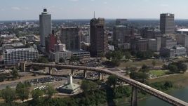 5.7K aerial stock footage of flying by office towers in the Downtown Memphis, Tennessee skyline Aerial Stock Footage | DX0002_178_007