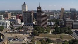 5.7K aerial stock footage ascend and orbit Raymond James Tower in Downtown Memphis, Tennessee Aerial Stock Footage | DX0002_178_016