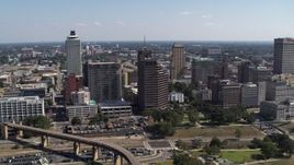 5.7K aerial stock footage fly away from Raymond James Tower in Downtown Memphis, Tennessee Aerial Stock Footage | DX0002_178_017