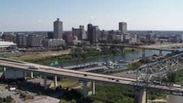 5.7K aerial stock footage approach the city's skyline from a bridge, Downtown Memphis, Tennessee Aerial Stock Footage | DX0002_178_029