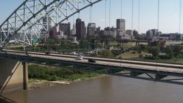 5.7K aerial stock footage flying past bridge while focused on the skyline of Downtown Memphis, Tennessee Aerial Stock Footage | DX0002_178_036