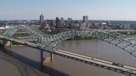 5.7K aerial stock footage ascending past bridge while focused on the skyline of Downtown Memphis, Tennessee Aerial Stock Footage | DX0002_178_037