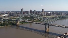 5.7K aerial stock footage descend with a view of the bridge and the skyline of Downtown Memphis, Tennessee Aerial Stock Footage | DX0002_178_042