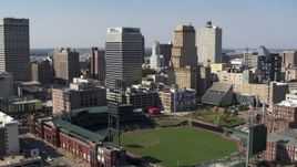 5.7K aerial stock footage of ascending toward tall office towers and baseball stadium in Downtown Memphis, Tennessee Aerial Stock Footage | DX0002_179_001