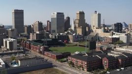 5.7K aerial stock footage descend with view of tall office towers and a baseball stadium in Downtown Memphis, Tennessee Aerial Stock Footage | DX0002_179_004