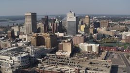 5.7K aerial stock footage of a reverse view of high-rise office buildings in Downtown Memphis, Tennessee Aerial Stock Footage | DX0002_179_024