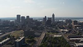 5.7K aerial stock footage a reverse view of high-rise office buildings in Downtown Memphis, Tennessee skyline Aerial Stock Footage | DX0002_179_030