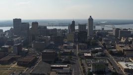 5.7K aerial stock footage fly away from high-rise office buildings in Downtown Memphis, Tennessee skyline Aerial Stock Footage | DX0002_179_033