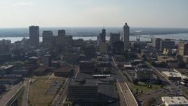 5.7K aerial stock footage fly by tall high-rise office buildings in Downtown Memphis, Tennessee skyline Aerial Stock Footage | DX0002_179_034