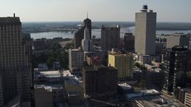 5.7K aerial stock footage focus on Lincoln American Tower while passing office buildings in Downtown Memphis, Tennessee Aerial Stock Footage | DX0002_180_003