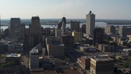 5.7K aerial stock footage focus on Lincoln American Tower while flying by office buildings in Downtown Memphis, Tennessee Aerial Stock Footage | DX0002_180_004