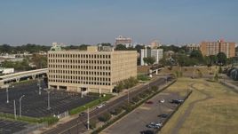 5.7K aerial stock footage orbit and fly toward an office building, Downtown Memphis, Tennessee Aerial Stock Footage | DX0002_180_010