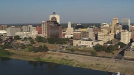 5.7K aerial stock footage of office buildings near Wolf River Harbor during descent, Downtown Memphis, Tennessee Aerial Stock Footage | DX0002_180_016