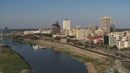 5.7K aerial stock footage a reverse view of office buildings by Wolf River Harbor, Downtown Memphis, Tennessee Aerial Stock Footage | DX0002_180_019