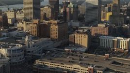 5.7K aerial stock footage ascend over FedEx Forum arena at sunset toward hotel in Downtown Memphis, Tennessee Aerial Stock Footage | DX0002_180_038