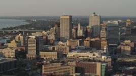 5.7K aerial stock footage of slowly flying past office towers at sunset, Downtown Memphis, Tennessee Aerial Stock Footage | DX0002_181_003