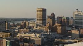 5.7K aerial stock footage reverse view of One Commerce Square office tower at sunset, Downtown Memphis, Tennessee Aerial Stock Footage | DX0002_181_005