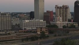 5.7K aerial stock footage of approaching Memphis City Hall at sunset in Downtown Memphis, Tennessee Aerial Stock Footage | DX0002_181_034