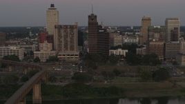 5.7K aerial stock footage pass apartment and office high-rises at sunset in Downtown Memphis, Tennessee Aerial Stock Footage | DX0002_181_039