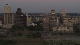 5.7K aerial stock footage Raymond Jame Tower and office buildings at sunset in Downtown Memphis, Tennessee Aerial Stock Footage | DX0002_181_040