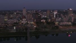 5.7K aerial stock footage of a reverse view of downtown from across the river at twilight in Downtown Memphis, Tennessee Aerial Stock Footage | DX0002_182_006