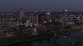 5.7K aerial stock footage descend with a view of downtown from across the river at twilight in Downtown Memphis, Tennessee Aerial Stock Footage | DX0002_182_007