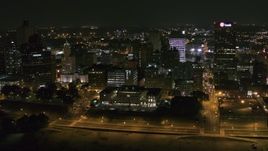 5.7K aerial stock footage flying by downtown office buildings at night, Downtown Memphis, Tennessee Aerial Stock Footage | DX0002_182_015