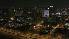 5.7K aerial stock footage passing by downtown office buildings at night, Downtown Memphis, Tennessee Aerial Stock Footage | DX0002_182_016