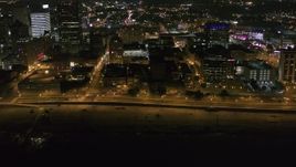 5.7K aerial stock footage orbit office buildings and Riverside Drive at night in Downtown Memphis, Tennessee Aerial Stock Footage | DX0002_182_027