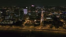 5.7K aerial stock footage wide orbit of the One Commerce Square office tower at night in Downtown Memphis, Tennessee Aerial Stock Footage | DX0002_182_028
