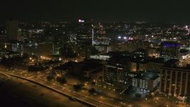 5.7K aerial stock footage of the One Commerce Square office tower at night in Downtown Memphis, Tennessee Aerial Stock Footage | DX0002_182_029