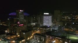 5.7K aerial stock footage stationary view of One Commerce Square and First Tennessee Building at night in Downtown Memphis, Tennessee Aerial Stock Footage | DX0002_182_035