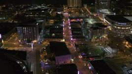5.7K aerial stock footage orbit intersection of Beale Street and BB King Boulevard at night in Downtown Memphis, Tennessee Aerial Stock Footage | DX0002_182_039