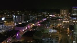5.7K aerial stock footage approach Beale Street and BB King Boulevard intersection at night in Downtown Memphis, Tennessee Aerial Stock Footage | DX0002_182_042
