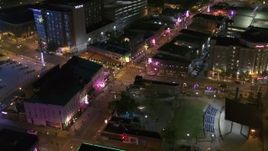 5.7K aerial stock footage fly toward Beale Street and BB King Boulevard intersection at night in Downtown Memphis, Tennessee Aerial Stock Footage | DX0002_182_045