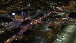 5.7K aerial stock footage fly toward intersection of Beale Street and BB King Boulevard at night in Downtown Memphis, Tennessee Aerial Stock Footage | DX0002_182_048