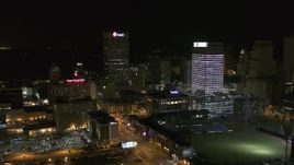 5.7K aerial stock footage view of One Commerce Square and First Tennessee Building at night, slow descent, Downtown Memphis, Tennessee Aerial Stock Footage | DX0002_182_055