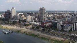 5.7K aerial stock footage of reverse view of One Commerce Square and office buildings, Downtown Memphis, Tennessee Aerial Stock Footage | DX0002_183_003