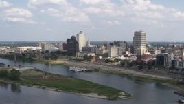 5.7K aerial stock footage of flying by and away from the city's skyline, Downtown Memphis, Tennessee Aerial Stock Footage | DX0002_183_004