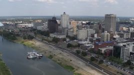 5.7K aerial stock footage fly past and away from the city's skyline in Downtown Memphis, Tennessee Aerial Stock Footage | DX0002_183_007