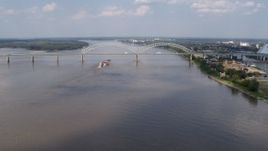 5.7K aerial stock footage a wide orbit of the Hernando de Soto Bridge and Mississippi River, Memphis, Tennessee Aerial Stock Footage | DX0002_183_010