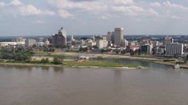 5.7K aerial stock footage of city's skyline across the Mississippi River, Downtown Memphis, Tennessee Aerial Stock Footage | DX0002_183_014
