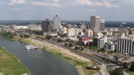 5.7K aerial stock footage orbit office buildings and fly away from Downtown Memphis, Tennessee Aerial Stock Footage | DX0002_183_017
