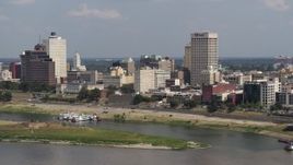 5.7K aerial stock footage of One Commerce Square towering over city buildings, Downtown Memphis, Tennessee Aerial Stock Footage | DX0002_183_023