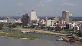 5.7K aerial stock footage of orbiting city buildings between office towers, Downtown Memphis, Tennessee Aerial Stock Footage | DX0002_183_025