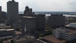 5.7K aerial stock footage of slowly circling a county government building beside police station in Downtown Memphis, Tennessee Aerial Stock Footage | DX0002_184_011