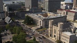 5.7K aerial stock footage flying away from courthouse and church in Downtown Memphis, Tennessee Aerial Stock Footage | DX0002_184_022