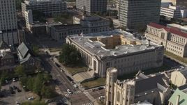 5.7K aerial stock footage ascend over church and focus on courthouse, Downtown Memphis, Tennessee Aerial Stock Footage | DX0002_184_023