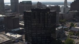 5.7K aerial stock footage of flying away from courthouse and office building in Downtown Memphis, Tennessee Aerial Stock Footage | DX0002_184_030